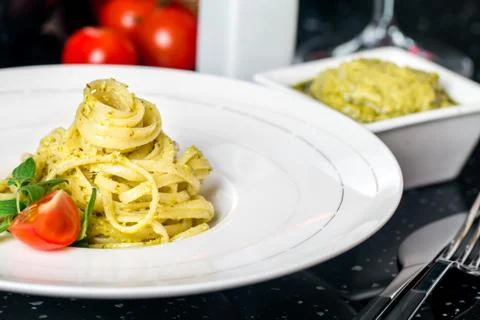 Pasta spaghetti with pesto Stock Photos