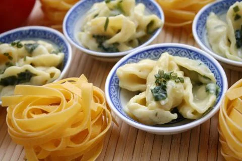 Pasta with spinach Stock Photos