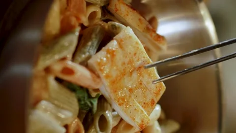 Pasta with squid. Slow motion. 120 fps. Vertical video Stock Footage 172439992