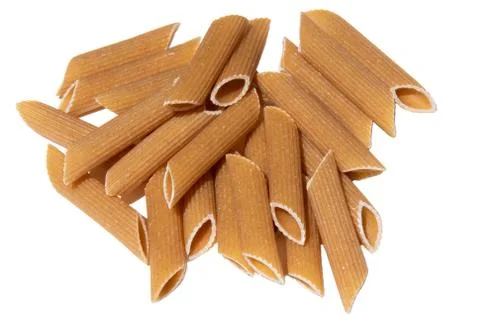 Pasta stack isolated on white. italian wholegrain penne lunch ingredient. hea Stock Photos