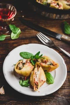 Pasta stuffed with ground beef, spinach and cheese Stock Photos