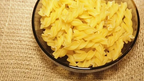 Pasta in the tank while rotating, close-up.Full hd video Stock Footage 75615927