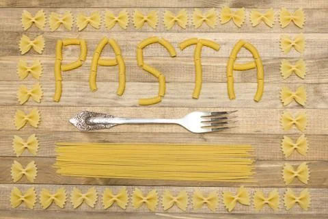 Pasta  text made of raw pasta Stock Photos