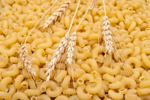 Pasta with wheat ears Stock Photos