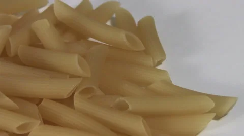 Pasta on white rotates macro Stock Footage 33716727