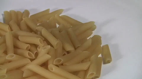 Pasta on white rotates macro Stock Footage 33716735