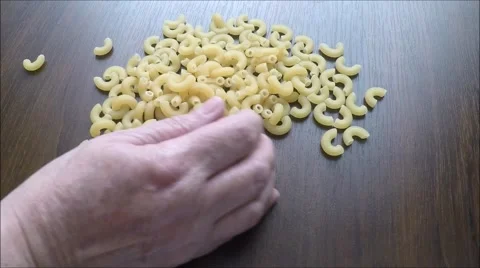 Pasta on wooden table Stock Footage 45861954