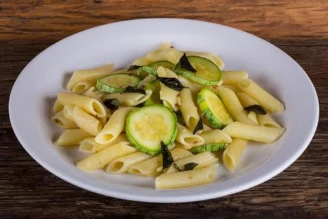 Pasta with zucchini Stock Photos