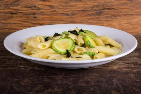 Pasta with zucchini Stock Photos