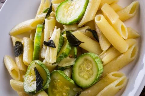 Pasta with zucchini Stock Photos