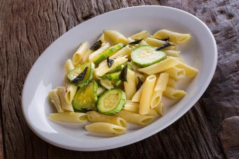 Pasta with zucchini Stock Photos