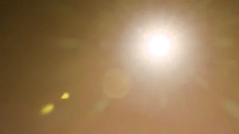Paste golden brown clear sky with bokeh sun light ray n lens flare sunlight beam Stock Footage 242158783