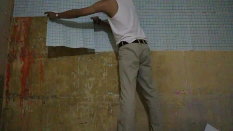 Paste paper on the wall Stock-Footage 78213864