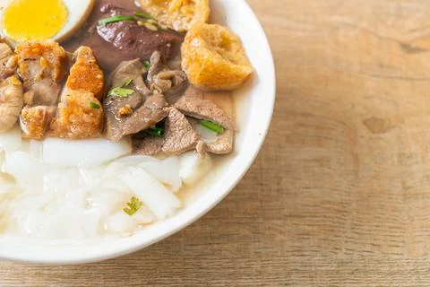 Paste of rice flour or boiled Chinese pasta square in clear soup Stock Photos