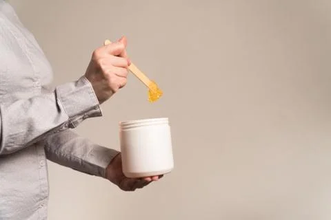 Paste for shugaring on a spatula average plan Stock Photos