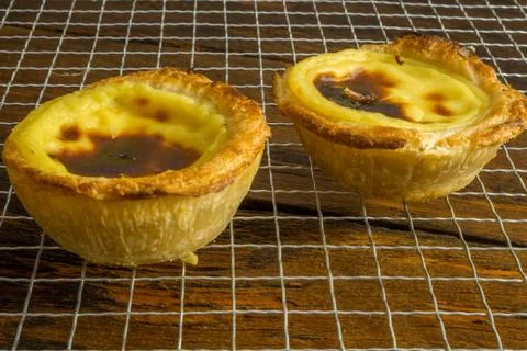 Pasteis de Belem is a typical Portuguese egg tart pastries. Pastel de nata. Stock Photos