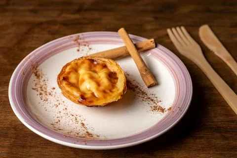 Pasteis de nata, typical sweet from Lisbon, Portugal, a cake on a plate, ci.. Stock Photos