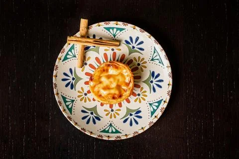 Pasteis de nata, typical sweet from Lisbon, Portugal, a cake on a decorated.. Stock Photos