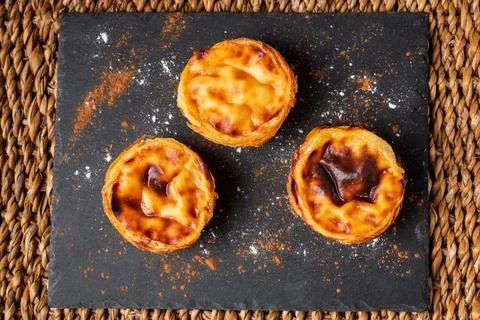 Pasteis de nata, typical sweet from Lisbon, Portugal, top view. Stock Photos