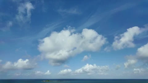 Pastel Clouds Over a Quiet Ocean Stock Footage 298277054