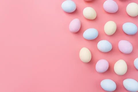 Pastel colored easter eggs pattern on pink background Stock Photos