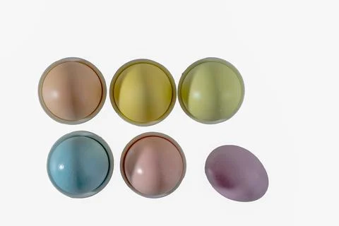 Pastel colored easter eggs rows on white Stock Photos