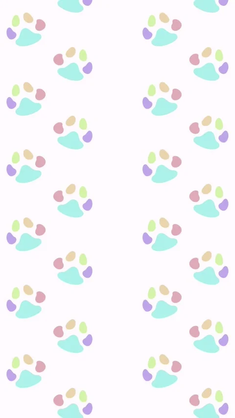 Pastel colored paw prints scroll upwards in two columns on light pink. Vídeo Stock 324084132