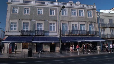 Pastel de Belem Building with close shots and Yellow Tram, Lisbon, Portugal Stock-Footage 187512538