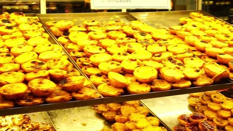 Pastel de nata o pastéis de Belém  (Portuguese egg tart) in the show window Stock Footage 244674794