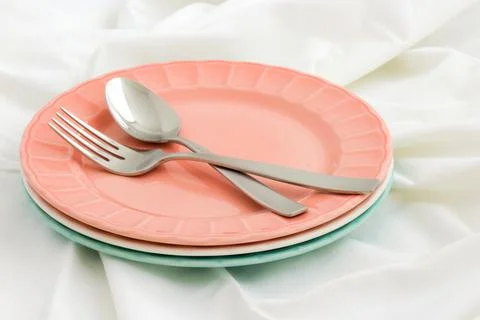 Pastel dinner plates Stock Photos