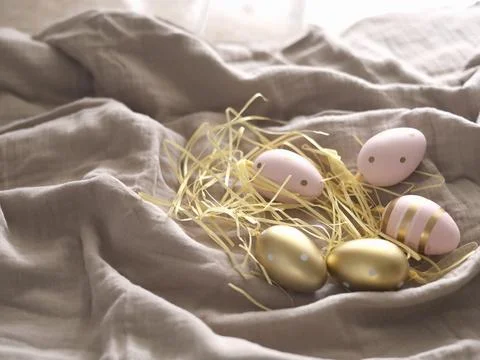Pastel Easter Eggs On Soft Linen Stock Photos