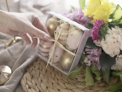 Pastel Easter Gift Box with Floral Bouquet Stock Photos