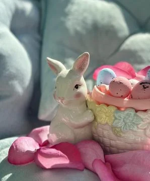 Pastel Easter Scene with Rabbit Figurine Stock Photos