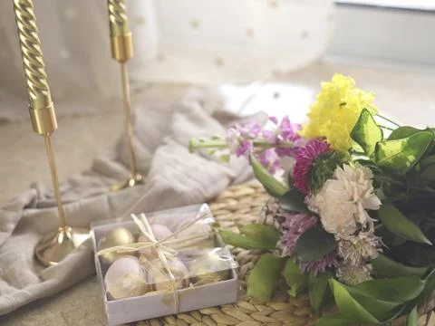 Pastel Easter Table With Floral Gift Box Stock Photos
