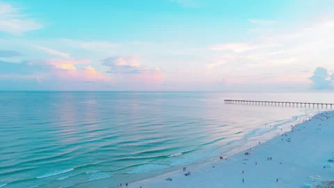 Pastel Evening Over Crowded Beach and Long Pier Stock Footage 341852848