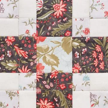 Pastel geometric patchwork block from pieces of fabrics, detail of quilt 스톡 사진