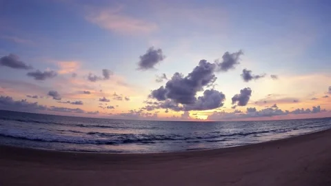 Pastel gold sunset cloud over sea water n ocean wave on purple blue sky Video stock 160646348