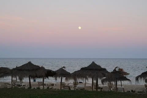 Pastel gradient sky after sunset on the beach in Hammamet ,Tunisia Stock Photos