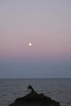 Pastel gradient sky after sunset on the beach in Hammamet ,Tunisia Stock Photos