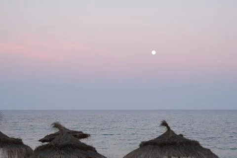 Pastel gradient sky after sunset on the beach in Hammamet ,Tunisia Stock Photos