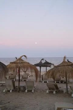 Pastel gradient sky after sunset on the beach in Hammamet ,Tunisia Stock Photos