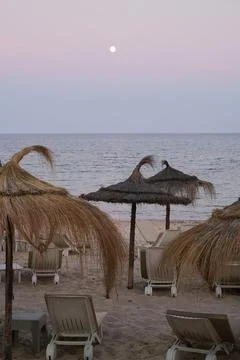 Pastel gradient sky after sunset on the beach in Hammamet ,Tunisia Stock Photos