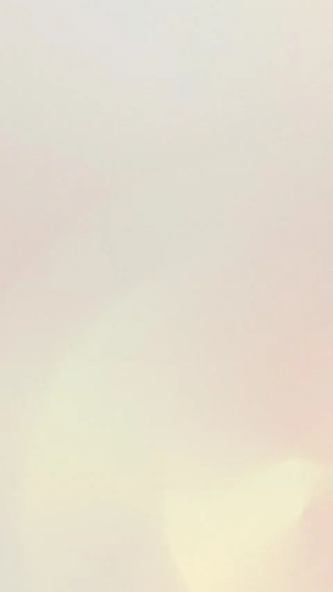 Pastel gradient with soft cream and pink hues. Seamless loop background. 4K. Stock Footage 309856127
