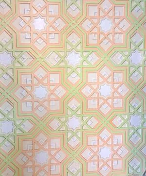 Pastel Islamic geometric pattern on mosque wall, arabic eight pointed star o Stock Photos
