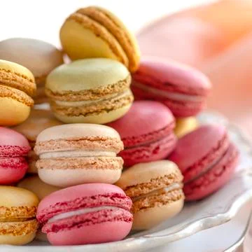 Pastel Macarons in selective focus for text over lay Fotos Stock