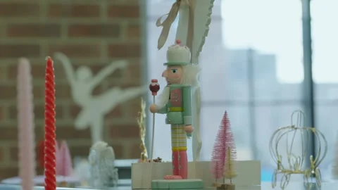 Pastel Nutcracker in a Magical Christmas Display with Brick Interior Stock Footage 303063585
