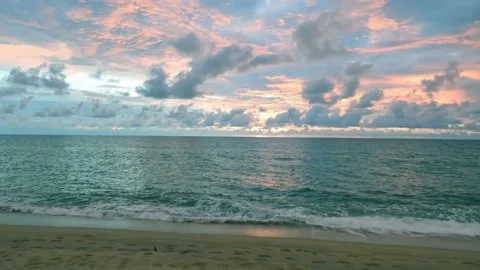 Pastel pink sunset cloud o cyan blue sky over sea ocean beach water Stock Footage 221835088
