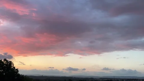 Pastel Pink Sunset Clouds Over Derbent and Distant Hills Stock Footage 344559583