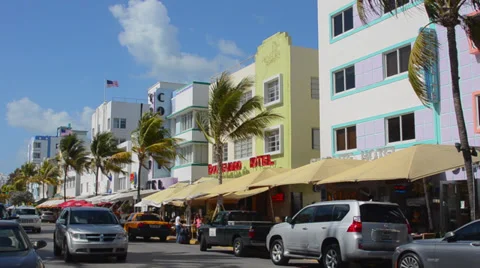 Pastel Retro Art Deco District of South Miami Beach Ocean Drive restaurants and Stock Footage