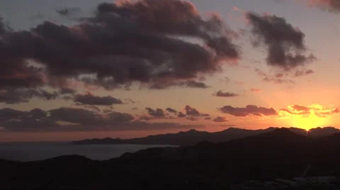 Pastel Sunset As Clouds Move Over Bay Stock-Footage 1012387